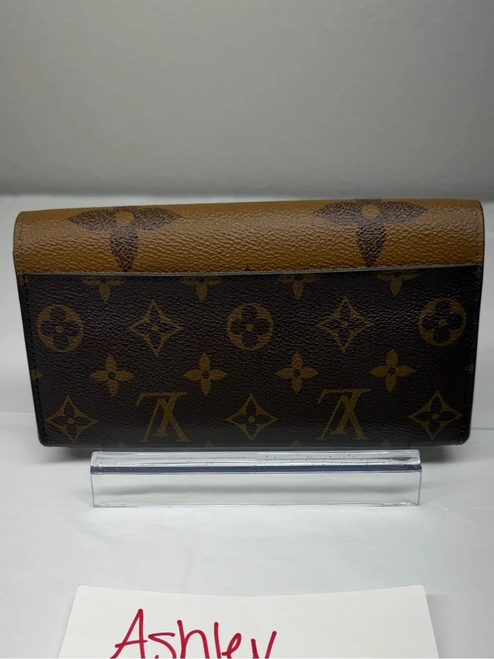 Louis Vuitton Sarah wallet in reverse monogram
